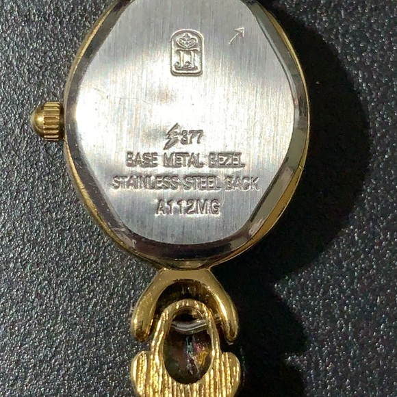 Gold Watch with Stainless Steel Back